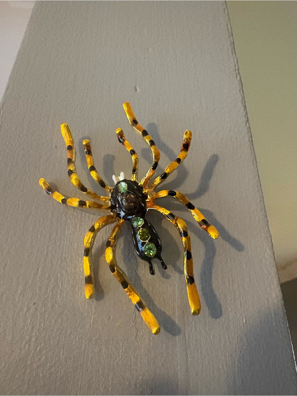 Yellow and Black Spider Brooch with Green Rhinestones